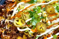 Loaded Taco Tater Tots Made in a Blackstone Pizza Oven