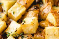 Crispy Garlic-Roasted Potatoes with Parmesan and Herbs