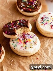 bitten thick frosted sugar cookie