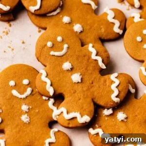 gingerbread men decorated with white buttercream