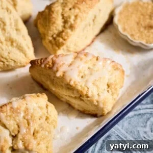 Sourdough Discard Scone Recipe: Flaky Base for Sweet or Savory Add-Ins 17 Sourdough Discard Scones drizzled with glaze.