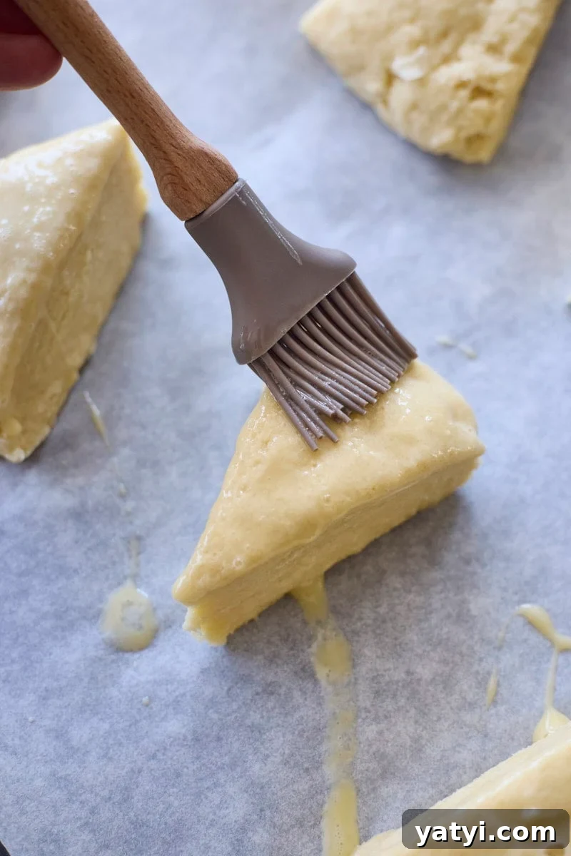 Sourdough Discard Scone Recipe: Flaky Base for Sweet or Savory Add-Ins 10 Scones brushed with egg wash.
