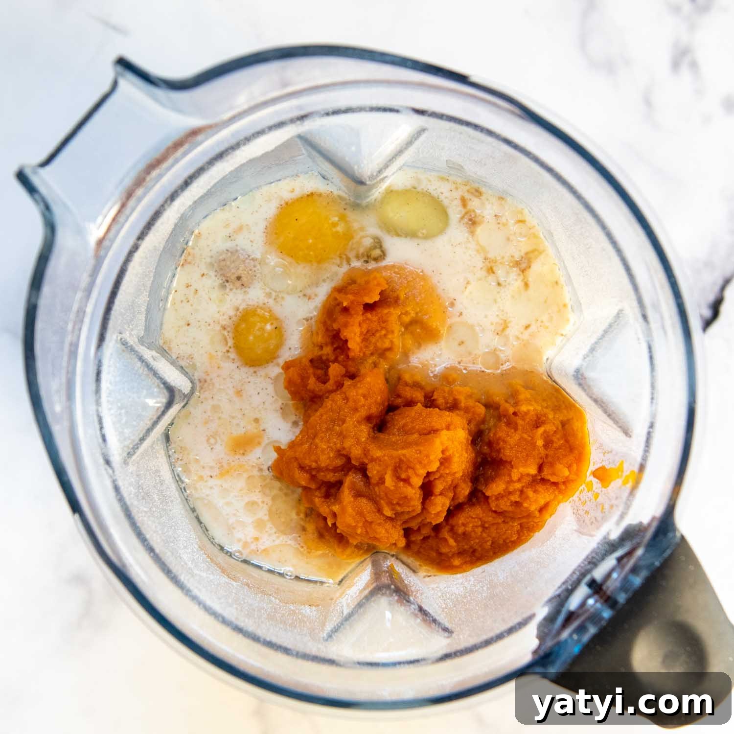 5-Minute Pumpkin Oat Flour Muffins — Light & Airy Bake 5 pumpkin puree, along with other wet ingredients being added.