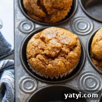5-Minute Pumpkin Oat Flour Muffins — Light & Airy Bake 9 close up of the top of a pumpkin muffin