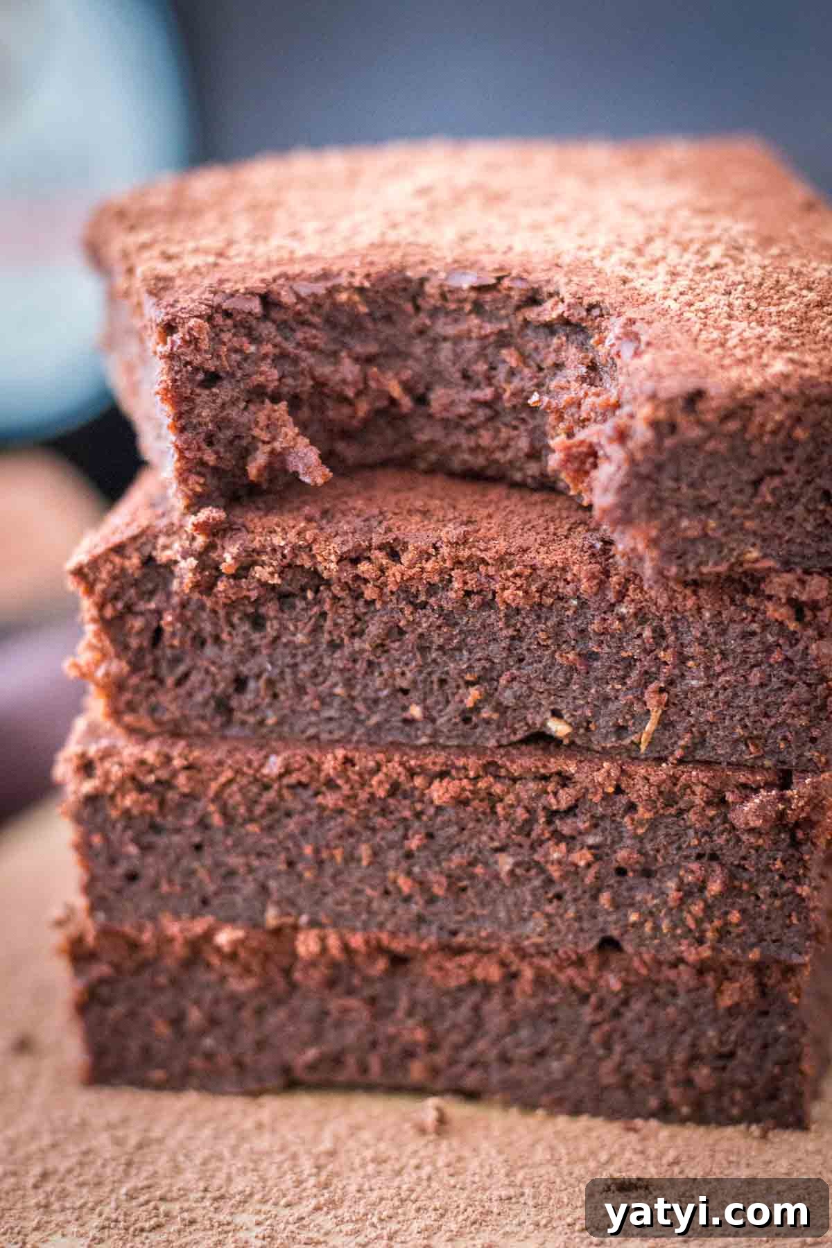 Guinness Chocolate Brownies with Rich Stout Flavor 7 Close up of Guinness Brownies served on a wooden plate