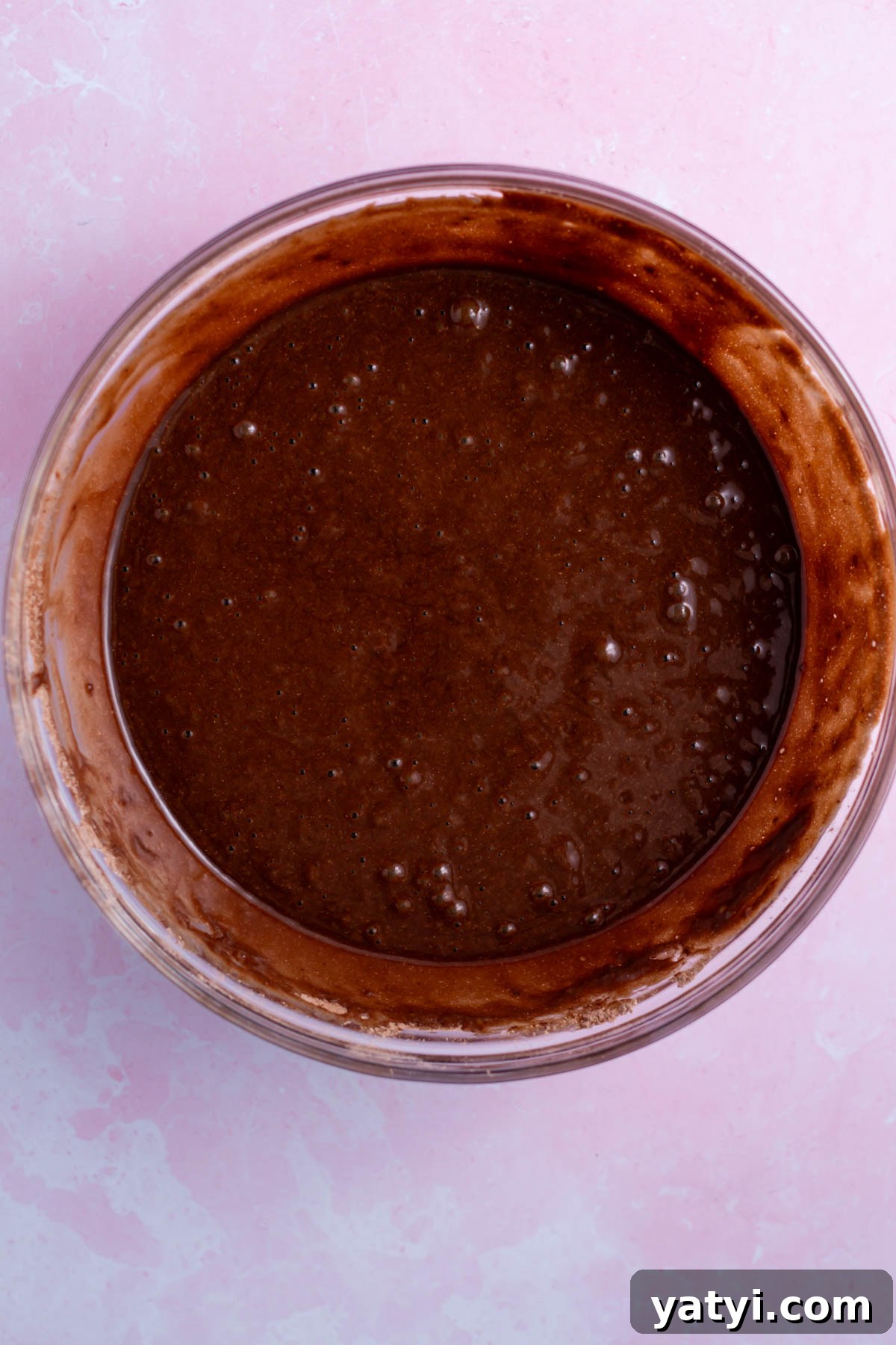 Moist Chocolate Cupcakes with Raspberry Filling and Ganache 12 chocolate batter in a mixing bowl