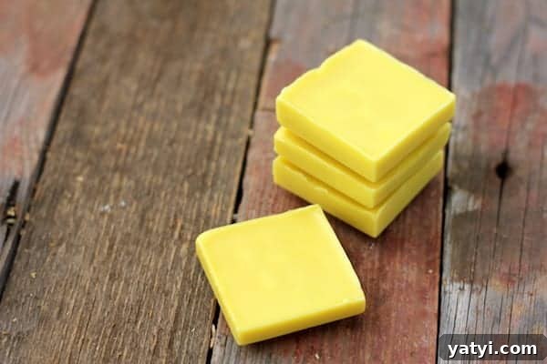 45 Homemade Stocking Stuffer Ideas Kids and Adults Will Love 11 Image shows several homemade lotion bars on a table