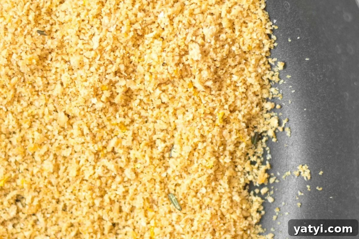 up close toasted breadcrumbs in a black pan