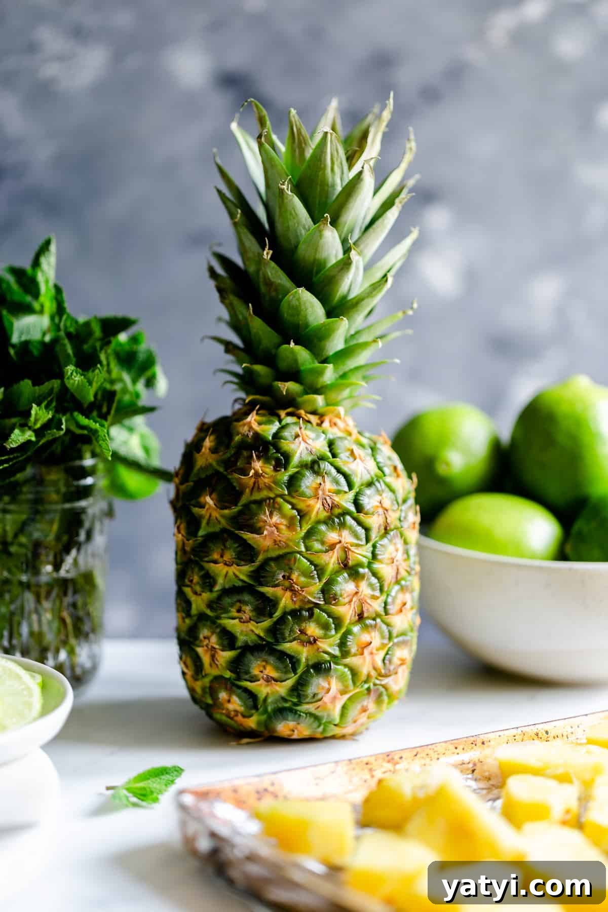 Frozen Pineapple Margarita Recipe — Tropical Cocktail Guide 3 large fresh pineapple and some fresh mint