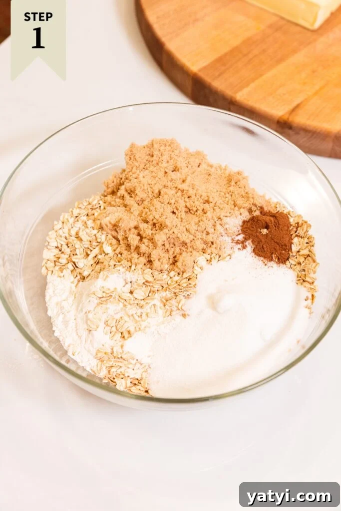 Chewy Cinnamon Apple Pie Bars: Easy Recipe for Fall Baking 5 Glass measuring cup filled with separate components of sugar, flour, brown sugar, and spices all on white surface.