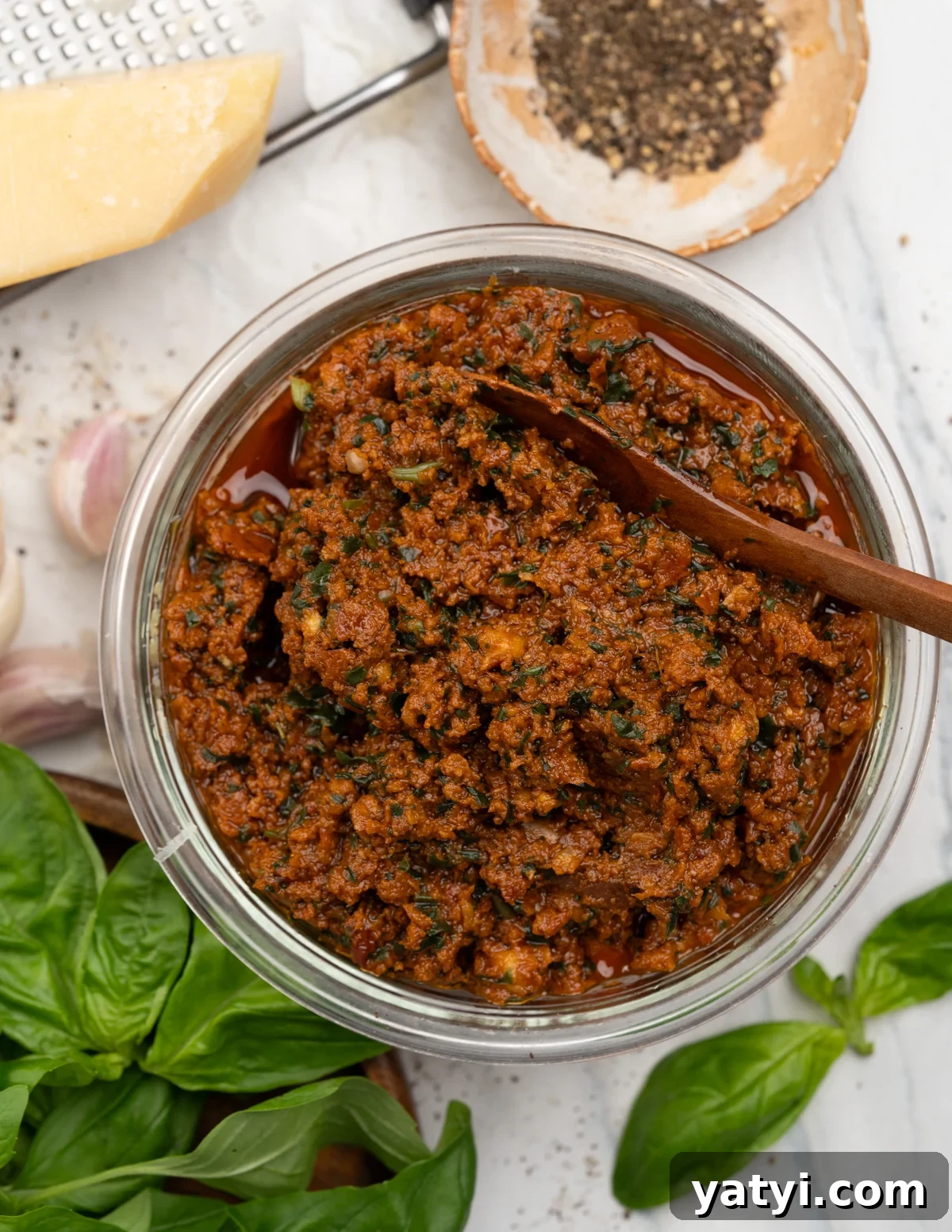 Sun-Dried Tomato Pesto (Pesto Rosso) Recipe & Uses 2 A bowl of vibrant red sun-dried tomato pesto or Pesto Rosso.