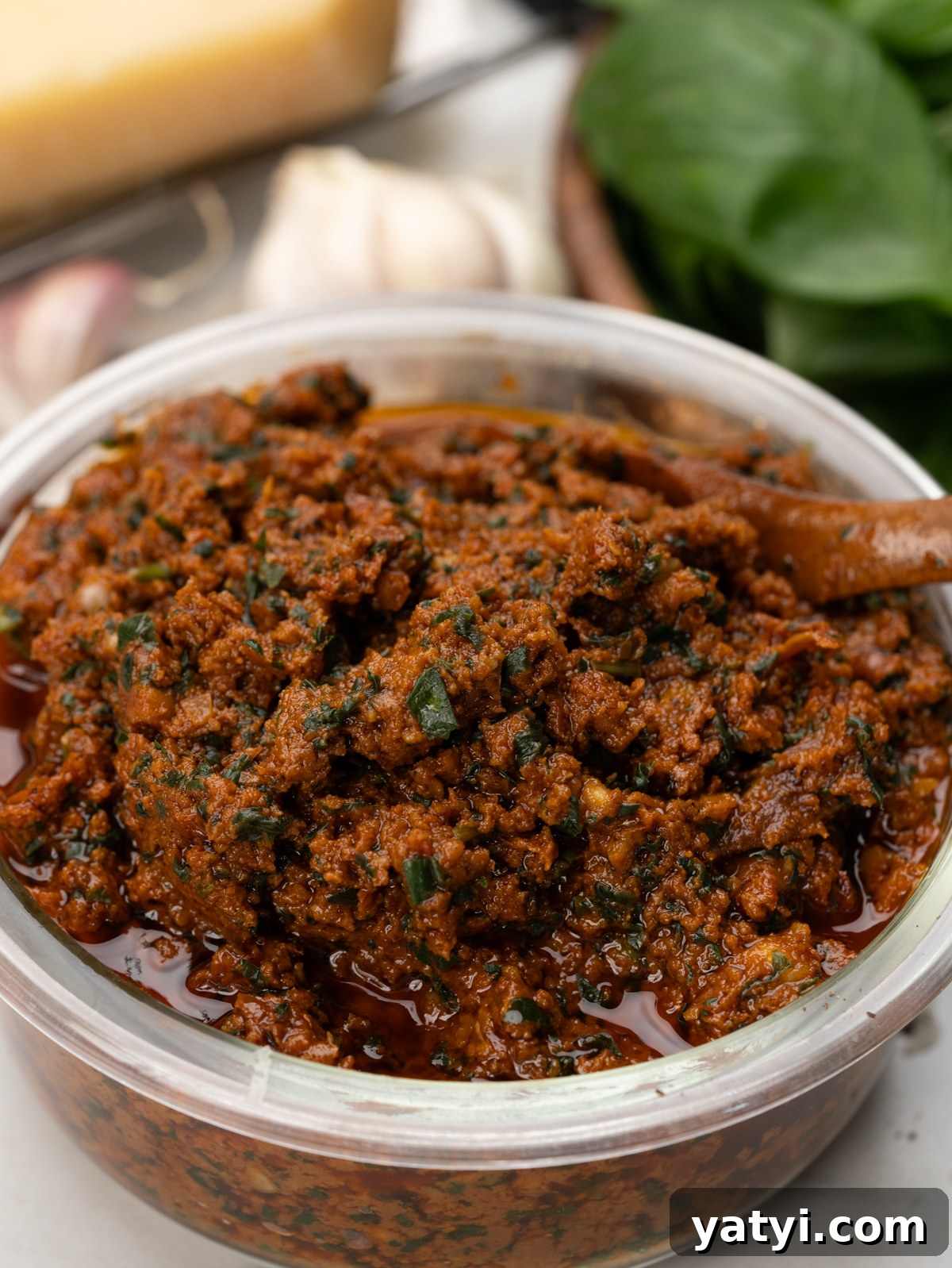Sun-Dried Tomato Pesto (Pesto Rosso) Recipe & Uses 6 A bowl of chunky, herby, sun-dried tomato pesto.