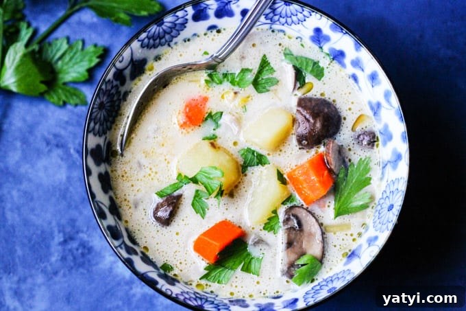 Polish Mushroom Soup with Yukon Gold Potatoes Recipe 7 Homemade mushroom chunky soup in a blue bowl