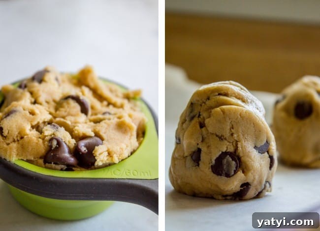 Brown Butter Chocolate Chip Cookies Recipe for Crispy Edges and Chewy Centers 11 chocolate chip cookie dough in a measuring cup, balls of chocolate chip cookie dough on parchment paper.