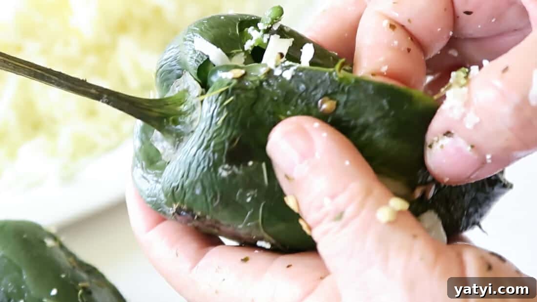 Authentic Chiles Rellenos: Mom’s Homemade Recipe with Video 13 closing the stuffed peppers