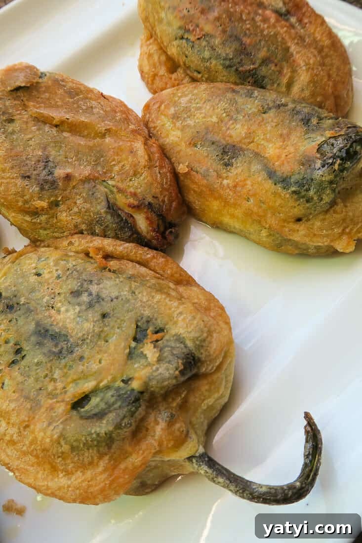 Authentic Chiles Rellenos: Mom’s Homemade Recipe with Video 4 a platter of authentic chiles rellenos