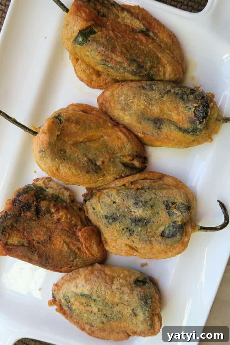 Authentic Chiles Rellenos: Mom’s Homemade Recipe with Video 6 a platter of authentic chiles rellenos