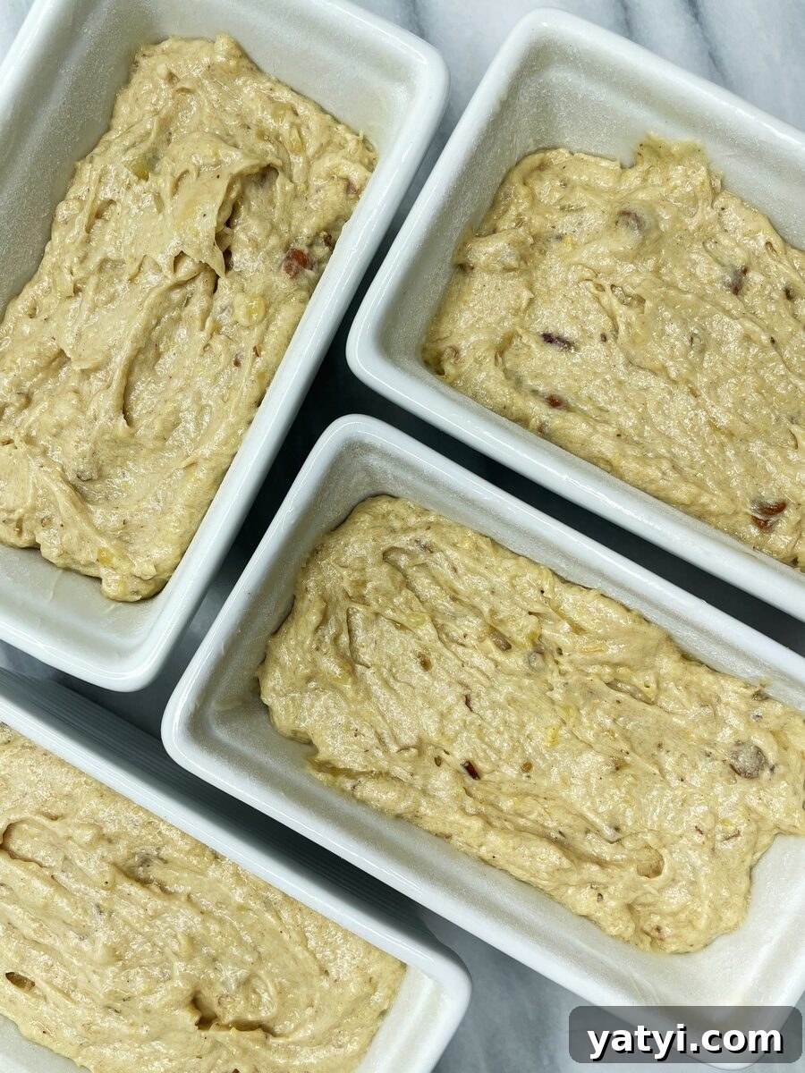 Loaf pans filled with batter