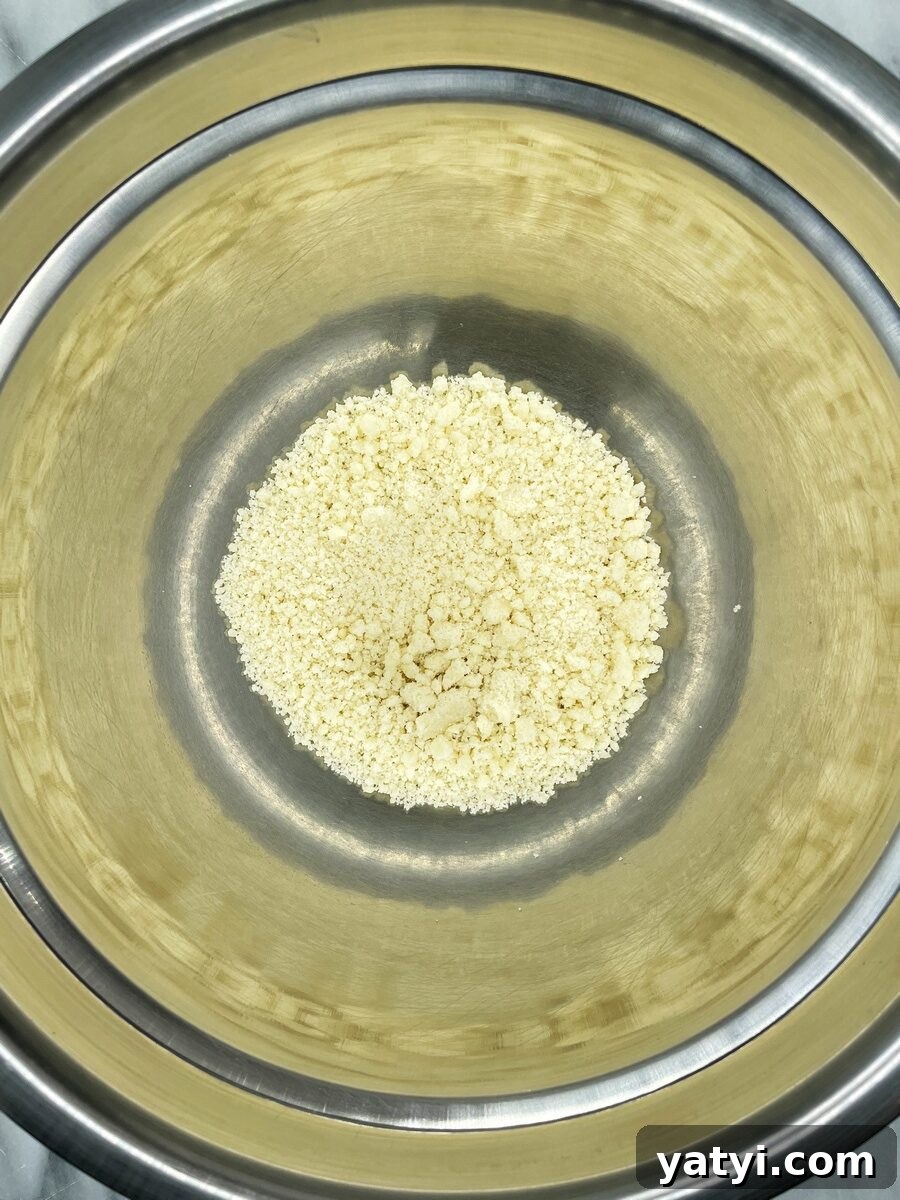 Crumble topping in a metal bowl