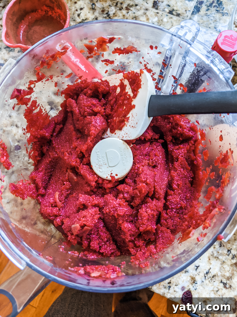 Chocolate Peppermint Beet Cake Recipe for Moist Holiday Dessert 5 The beet puree being added to the cake mixture