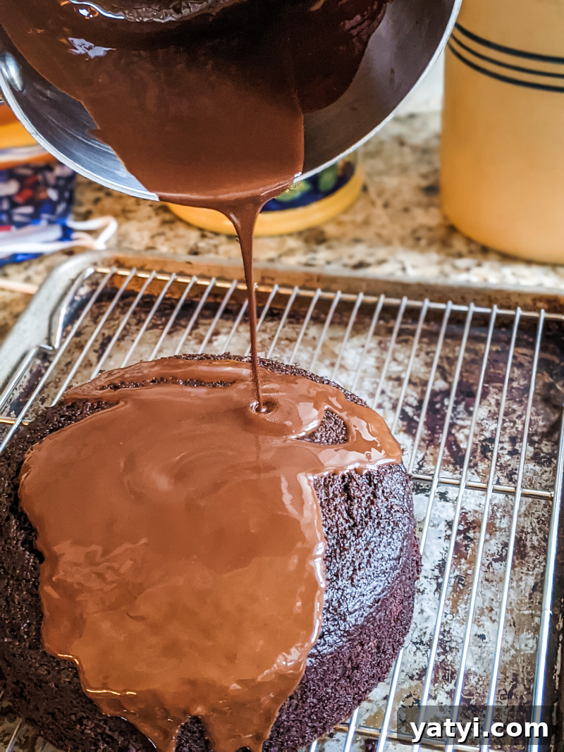 Chocolate Peppermint Beet Cake Recipe for Moist Holiday Dessert 6 The glaze being poured onto the Chocolate Peppermint Beet Cake