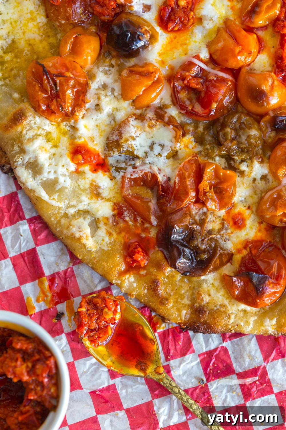 Tomato Confit Burrata and Arugula Pizza fresh from the oven