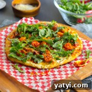 Tomato Confit Burrata and Arugula Pizza by Baking The Goods