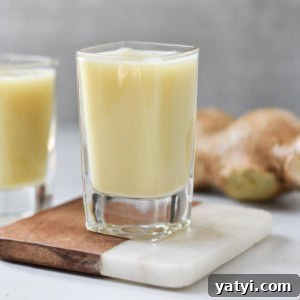 Ginger Juice Recipe: Make Fresh Ginger Juice with a Blender or Juicer 13 Two shots of ginger juice on a coaster.
