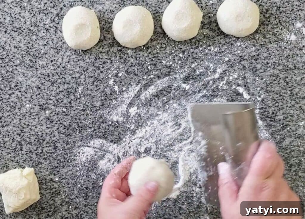 Gluten-Free Pita Bread Recipe: Soft, Flavorful, and Simple 5 rolling divided dough into smooth round dough balls.