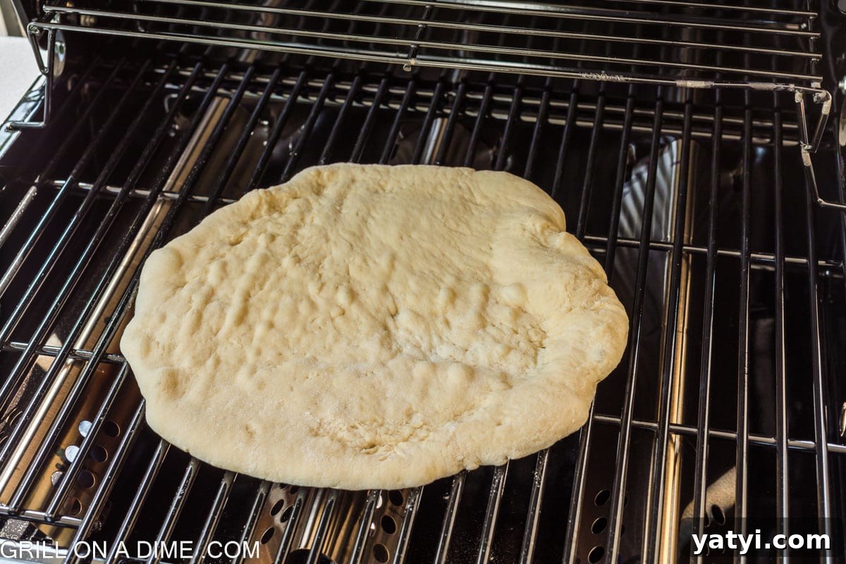 Pizza dough on the grill