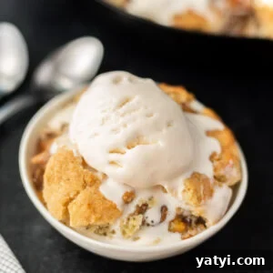 Peach Cobbler in a white bowl