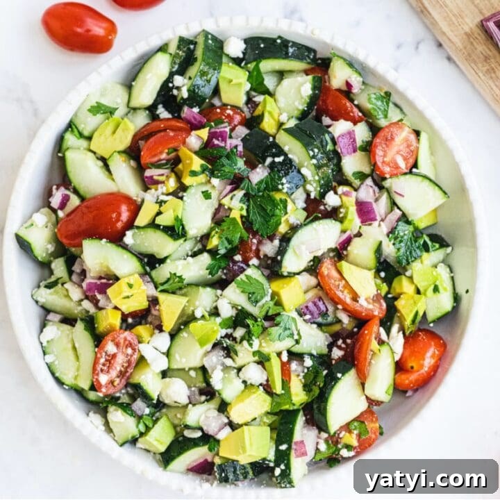 Image for Sunday side: Cucumber Tomato Salad with Avocado + Feta
