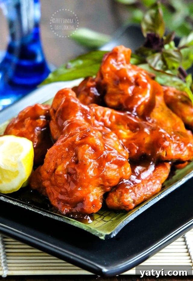 Savory Super Bowl Party Snacks and Crowd-Pleasing Appetizers 4 Chicken Wings in Honey-Sriracha Sauce recipe