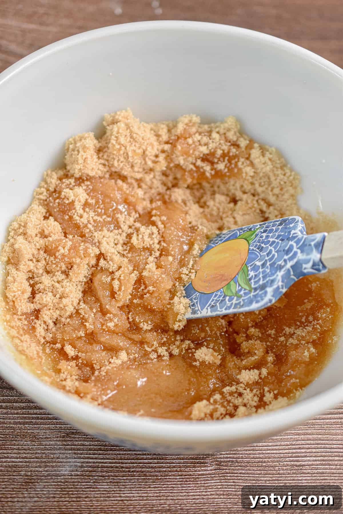 Sourdough Discard Zucchini Muffins Recipe (Quick & Moist) 5 The melted butter and brown sugar are in a large bowl.