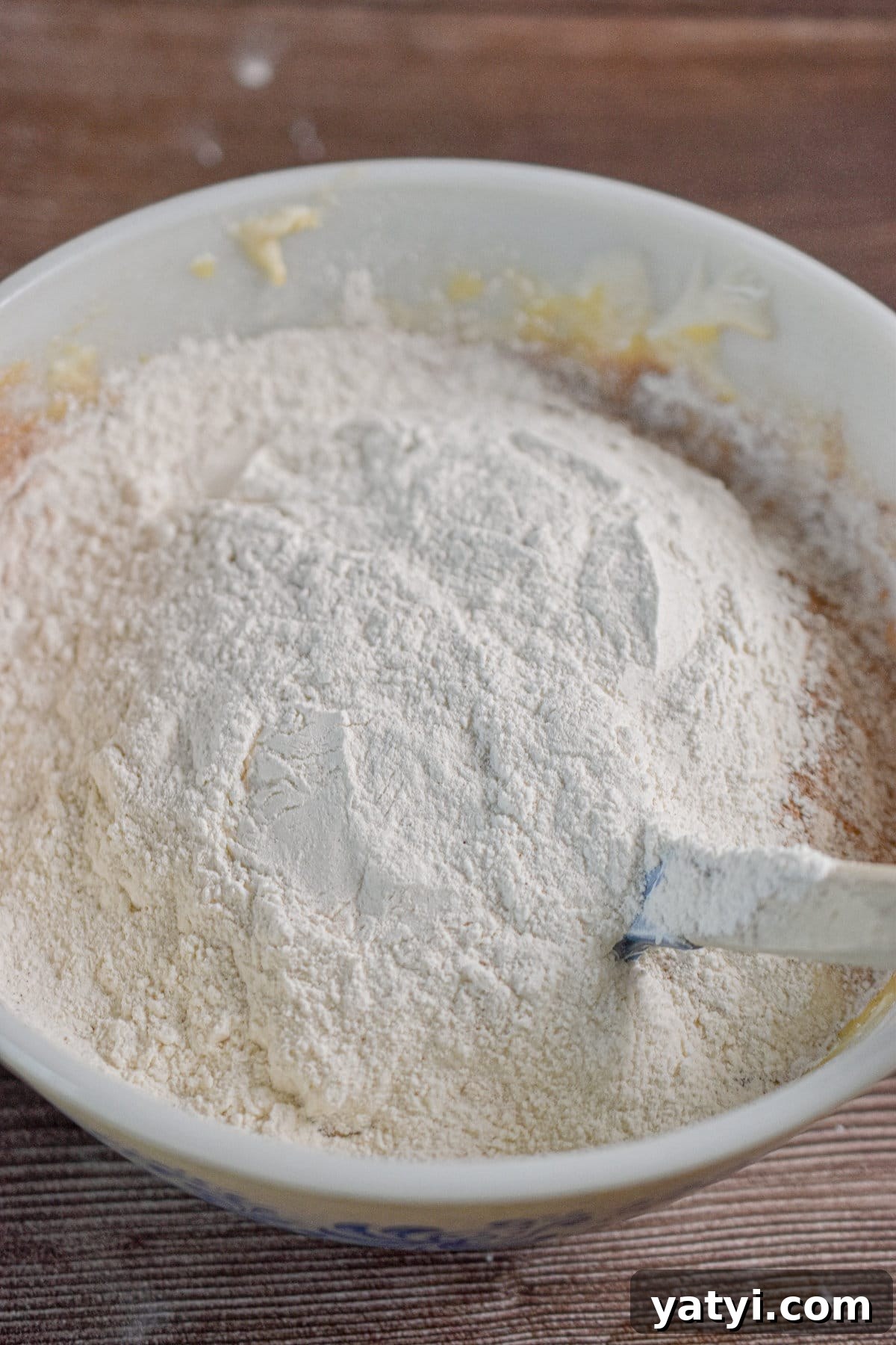 Sourdough Discard Zucchini Muffins Recipe (Quick & Moist) 7 The dry ingredients are added to the wet ingredients.