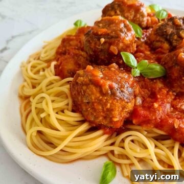 close up of spaghetti and meatballs