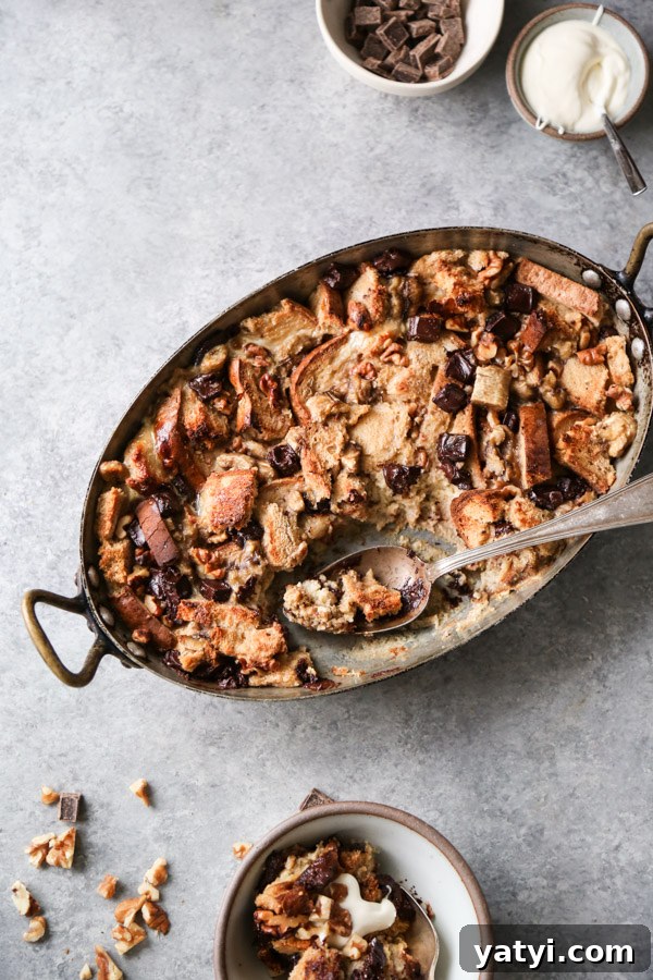 Gluten- and Dairy-Free Chocolate Chip Banana Bread Pudding 2 casserole dish of banana and bread pudding with chocolate chips on the side