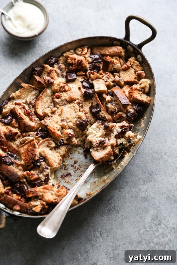 Gluten- and Dairy-Free Chocolate Chip Banana Bread Pudding 8 casserole dish of gluten-free dairy-free banana bread pudding with chocolate chips on the side