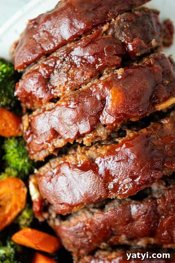 Hearty Keto Ground Beef Stew Recipe for Low-Carb Meals 7 overhead view of sliced keto meatloaf with ketchup glaze