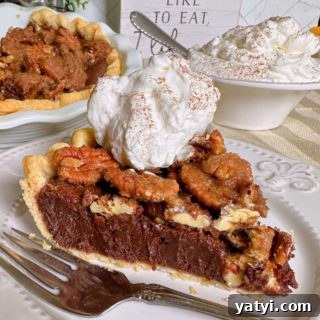 Decadent Chocolate Pecan Chess Pie Recipe for Home Bakers 15 Easy Chocolate Pecan Chess Pie sliced and on a plate with a dollop of whipped cream.
