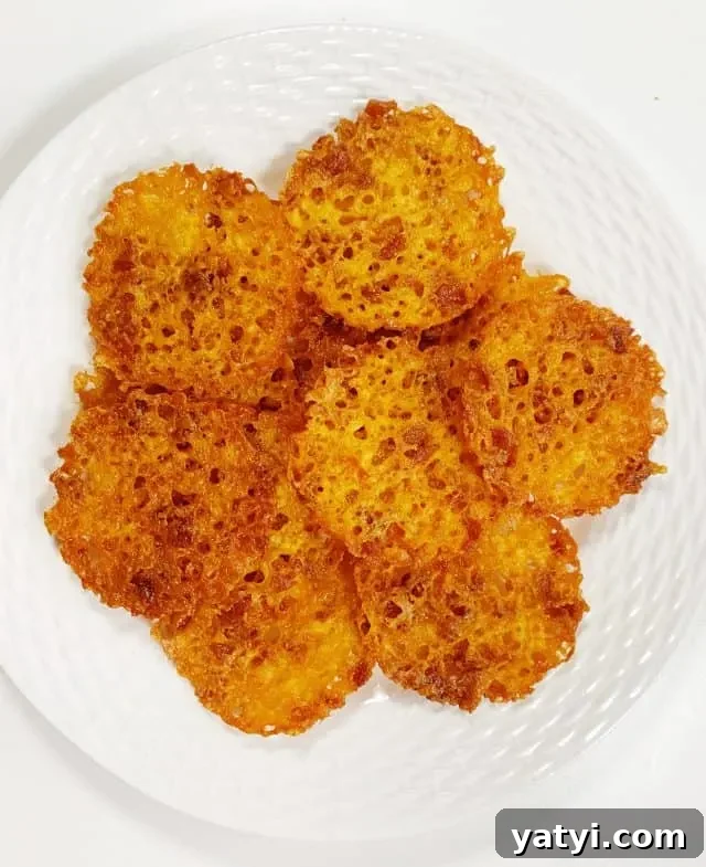 Keto Bacon & Cheddar Crisps — Low-Carb Snack Recipe 3 plate of bacon cheddar cheese crisp
