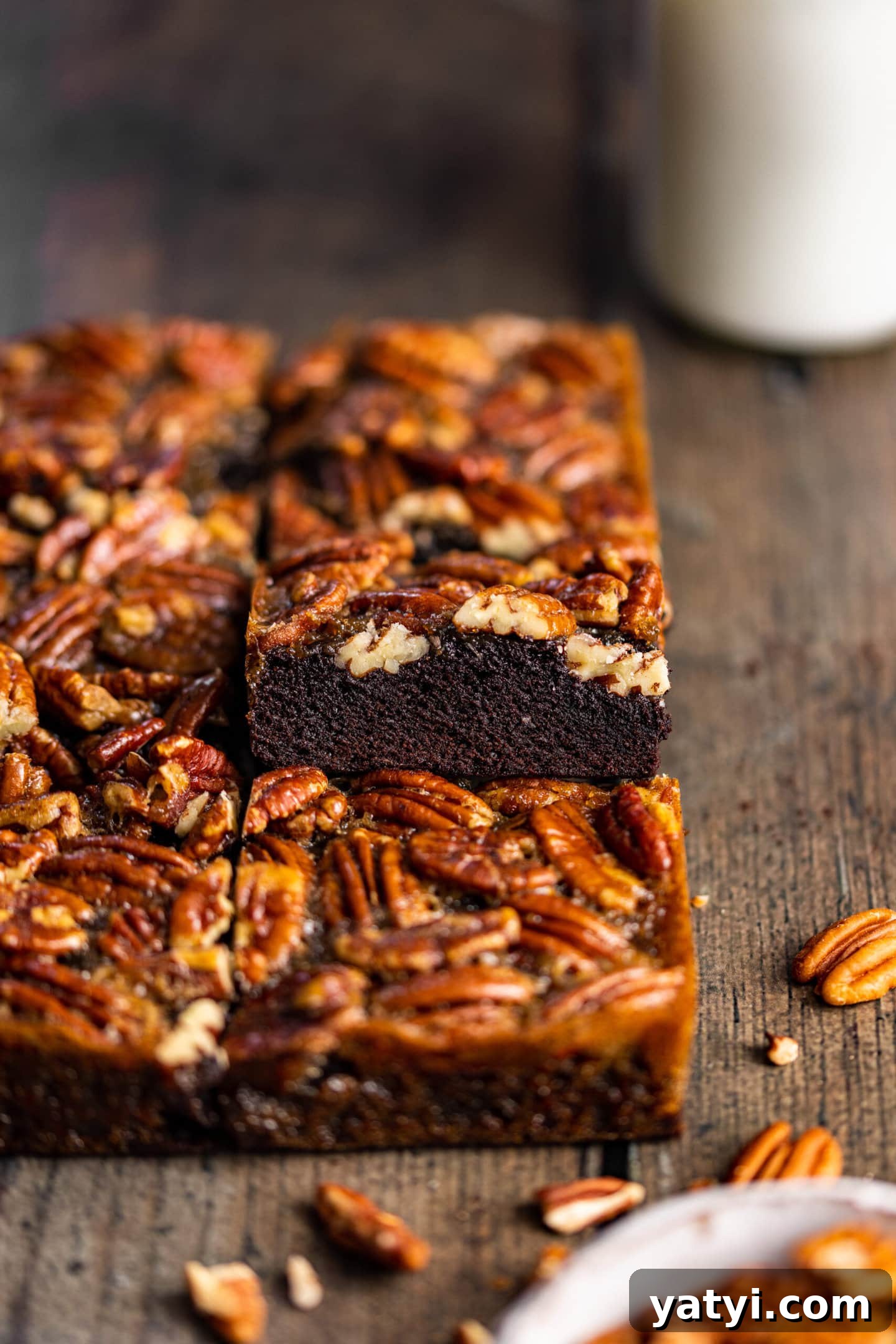 Decadent Pecan Pie Brownies Recipe — Gooey Chocolate Pecan Bars 4 Showing texture of pecan pie brownie