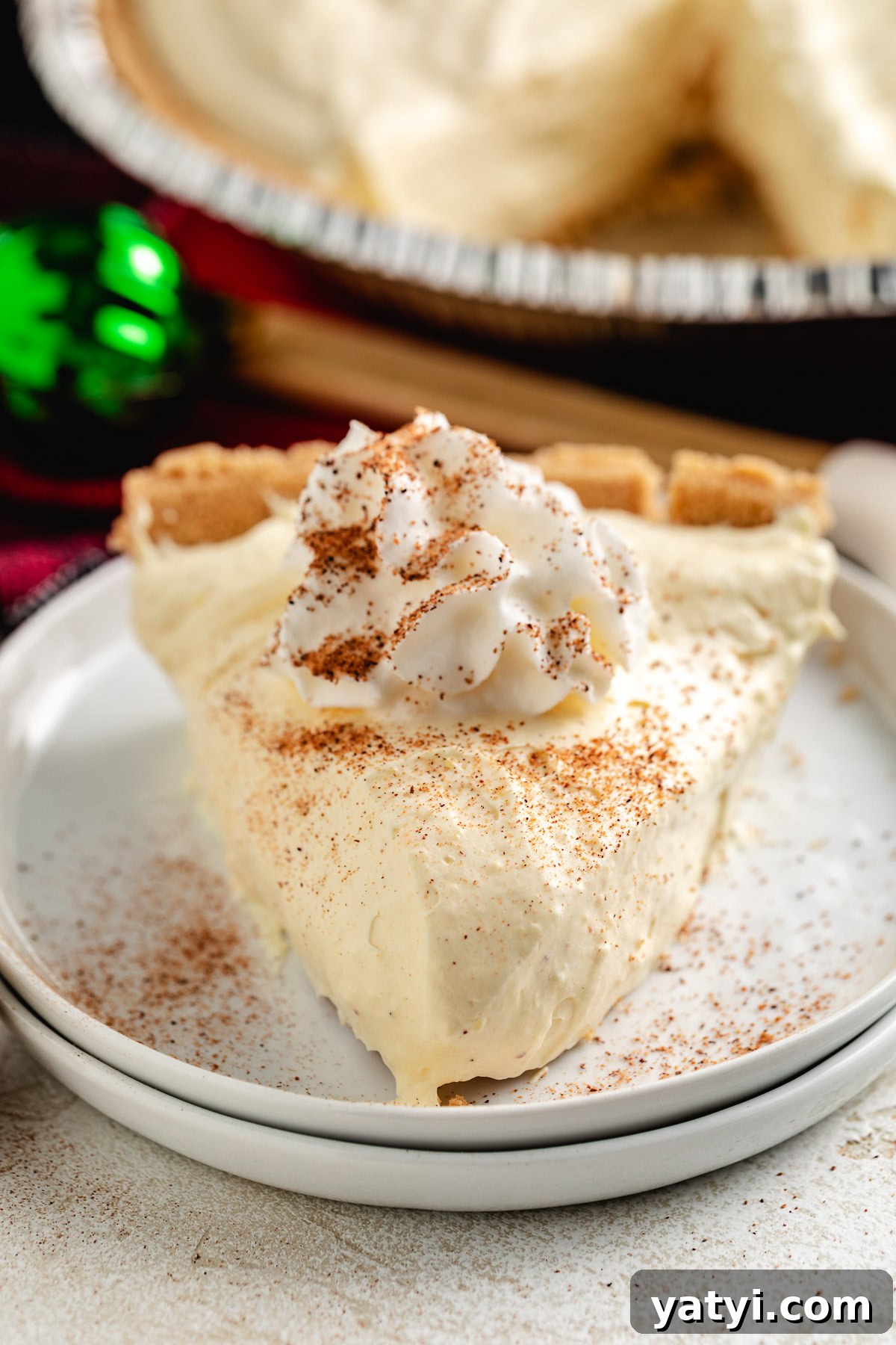 Creamy pie topped with whipped cream.