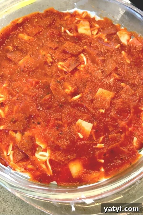 15-Minute Hot Pizza Dip Recipe: Savory Appetizer for Parties 5 pizza sauce and toppings