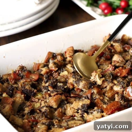 Bourbon-Infused Pumpernickel & Rye Stuffing Recipe 7 Rye and Pumpernickel Dressing with Bourbon and Bacon in a White Serving Dish.
