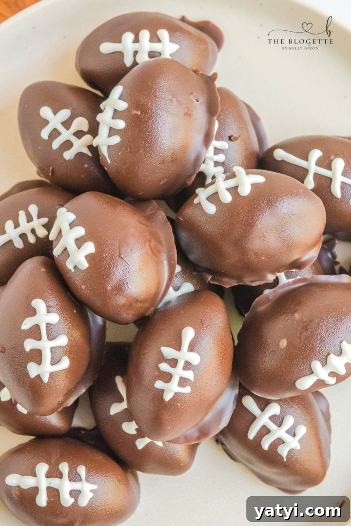 Oreo Football Truffles are perfect for the Super Bowl, Tailgating Parties, or even just to snack on during the game! Only 5 ingredients!