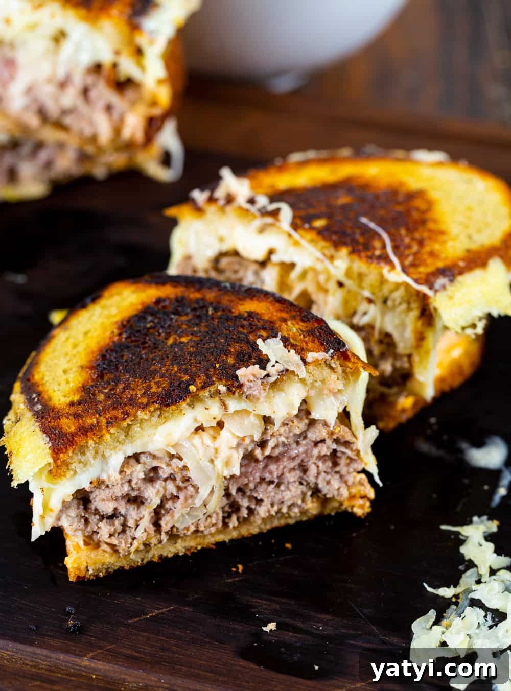 Turkey Reuben Patty Melt Recipe — Tangy Thousand Island Turkey Burgers 4 Patty Melt cut in half.