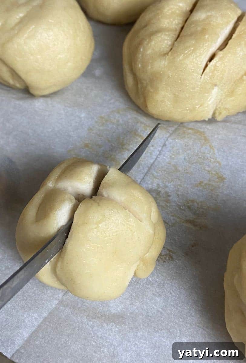Soft Chewy Pretzel Bites with Buttery Salted Crust 4 Dough being scored with sharp knife.