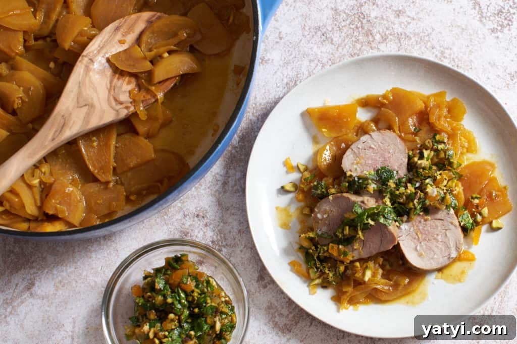 Pork Tenderloin with Roasted Golden Beets and Apricot-Mint Sauce 2 A plate of pork tenderloin with golden beets with a dish of apricot mint sauce.