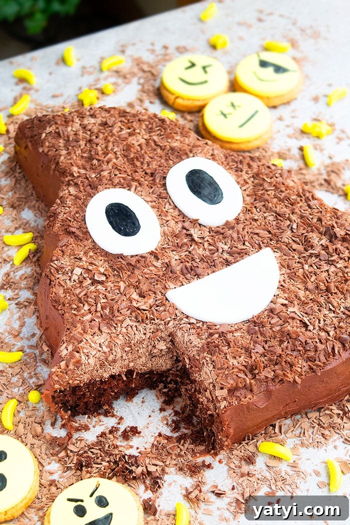 Emoji Birthday Cake With One Slice Removed on Gray Background